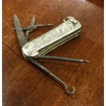 An attractive Edwardian silver fruit knife / butto