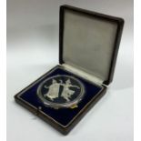 An attractive cased silver and Niello compact with