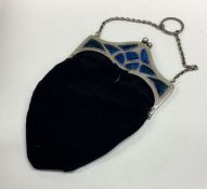 A stylish silver and enamelled purse with hinged t