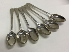 A set of six Georgian silver feather edged teaspoo