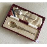 A cased silver gilt anointing spoon together with