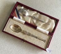 A cased silver gilt anointing spoon together with