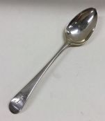 An OE pattern silver dessert spoon. London. By Hes