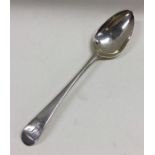 An OE pattern silver dessert spoon. London. By Hes