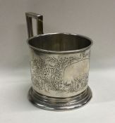A good Russian silver engraved cup holder on pedes