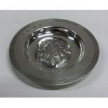 A large heavy circular silver armada dish with ree