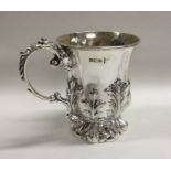 A good chased silver christening mug with cast scr
