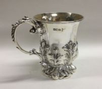 A good chased silver christening mug with cast scr