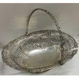 DUBLIN: A Georgian silver swing handled basket wit