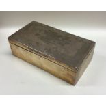 A heavy engine turned silver cigarette box. Birmin