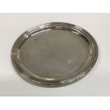 A stylish silver pin dish with reeded border. Appr
