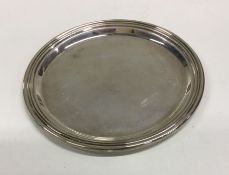 A stylish silver pin dish with reeded border. Appr