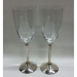 A good pair of silver and glass champagne flutes o