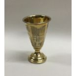 A Russian silver gilt tapering Kiddush cup. Approx