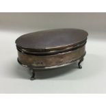 An oval silver hinged top ring box. Birmingham. By