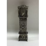 A novelty silver model of a grandfather clock deco