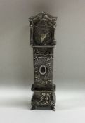 A novelty silver model of a grandfather clock deco