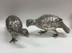 A good pair of heavy silver cast model grouse in s