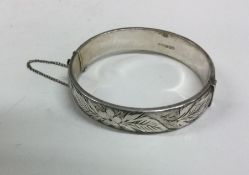 A small silver bracelet with concealed clasp. Birm