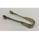 A pair of fiddle and thread pattern silver sugar t