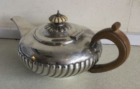 A good circular half fluted teapot. London 1827. A