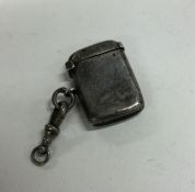 A small plain silver vesta case with hinged decora