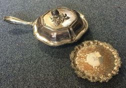 A silver plated warming pan together with a waiter