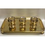 A rare silver gilt three bottle inkstand in George