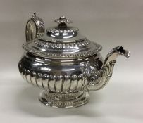 GLASGOW: A good Georgian circular silver teapot on