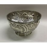 A good quality chased silver bowl decorated with f