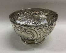 A good quality chased silver bowl decorated with f