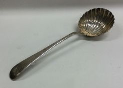 A Georgian OE pattern silver ladle with fluted bow