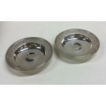 A good pair of circular silver armada dishes of ty