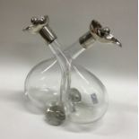 An Edwardian silver conjoining oil and vinegar bot