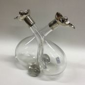 An Edwardian silver conjoining oil and vinegar bot