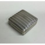 A good Dutch silver reeded pill box with hinged li