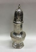 An Edwardian silver sugar caster of typical form.