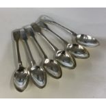 A collection of silver fiddle pattern teaspoons. L