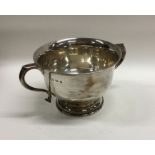 A heavy silver two handled sugar bowl. Sheffield.