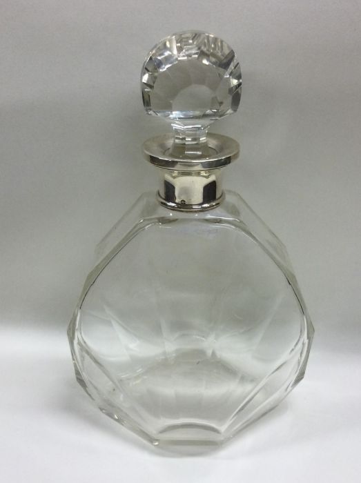 A good stylish silver and glass mounted decanter o