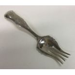 An attractive Continental silver fork decorated wi