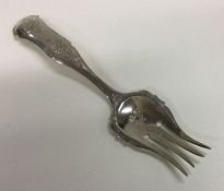 An attractive Continental silver fork decorated wi