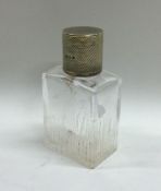 A good quality engine turned silver jar and cover