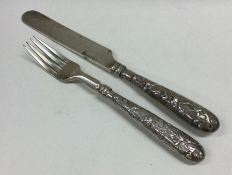 A finely cast Chinese silver knife together with m