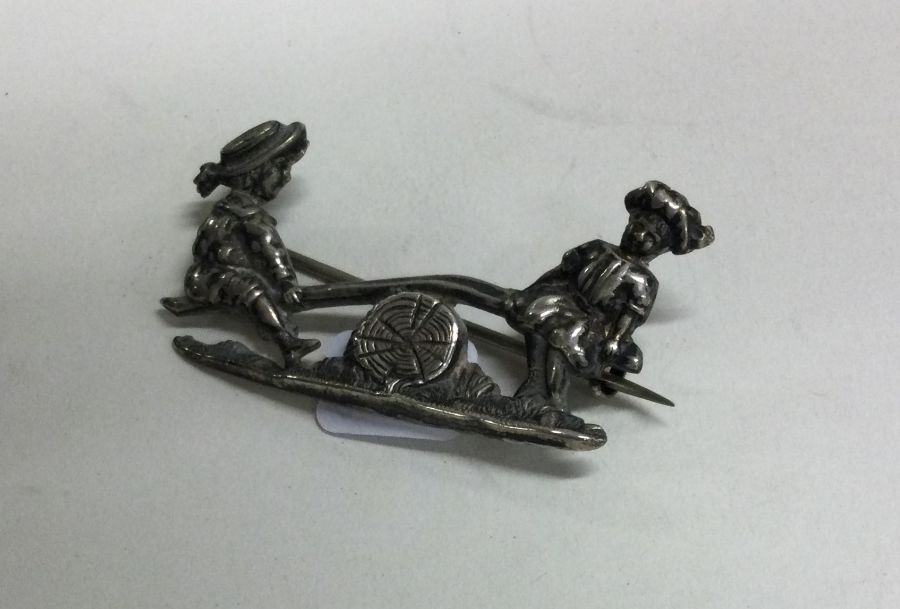 A rare Victorian silver brooch decorated with figu