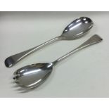 A pair of OE pattern silver salad servers of typic