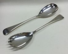 A pair of OE pattern silver salad servers of typic