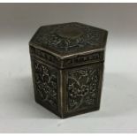 A good chased silver tea caddy of shaped form with