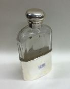 An attractive lady's silver hip flask with glass m