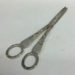 A good pair of cast silver grape scissors with flo